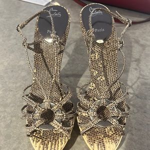 Louboutin. Snake skin. Sz 40.5